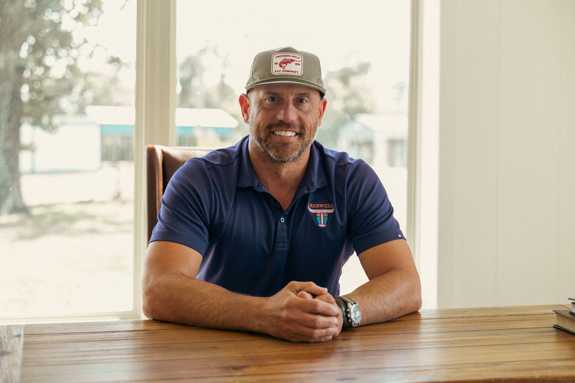 Tilmon Media commercial portrait photography of professional at a desk